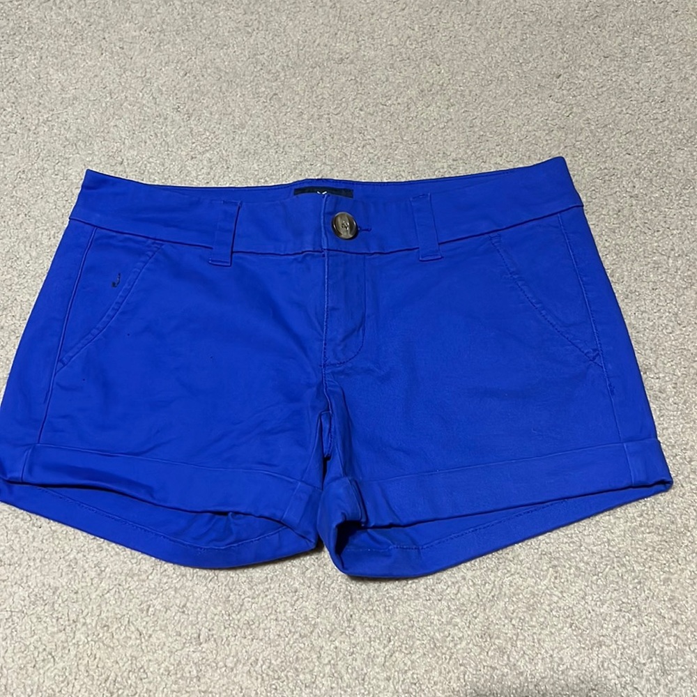 American Eagle royal blue midi stretch shorts.